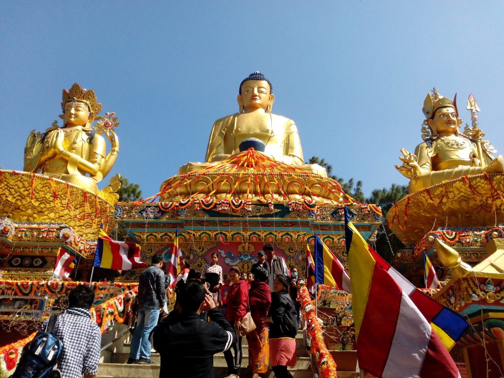 three-buddha-statues-in-the-temple-in-kathmandu-nepal